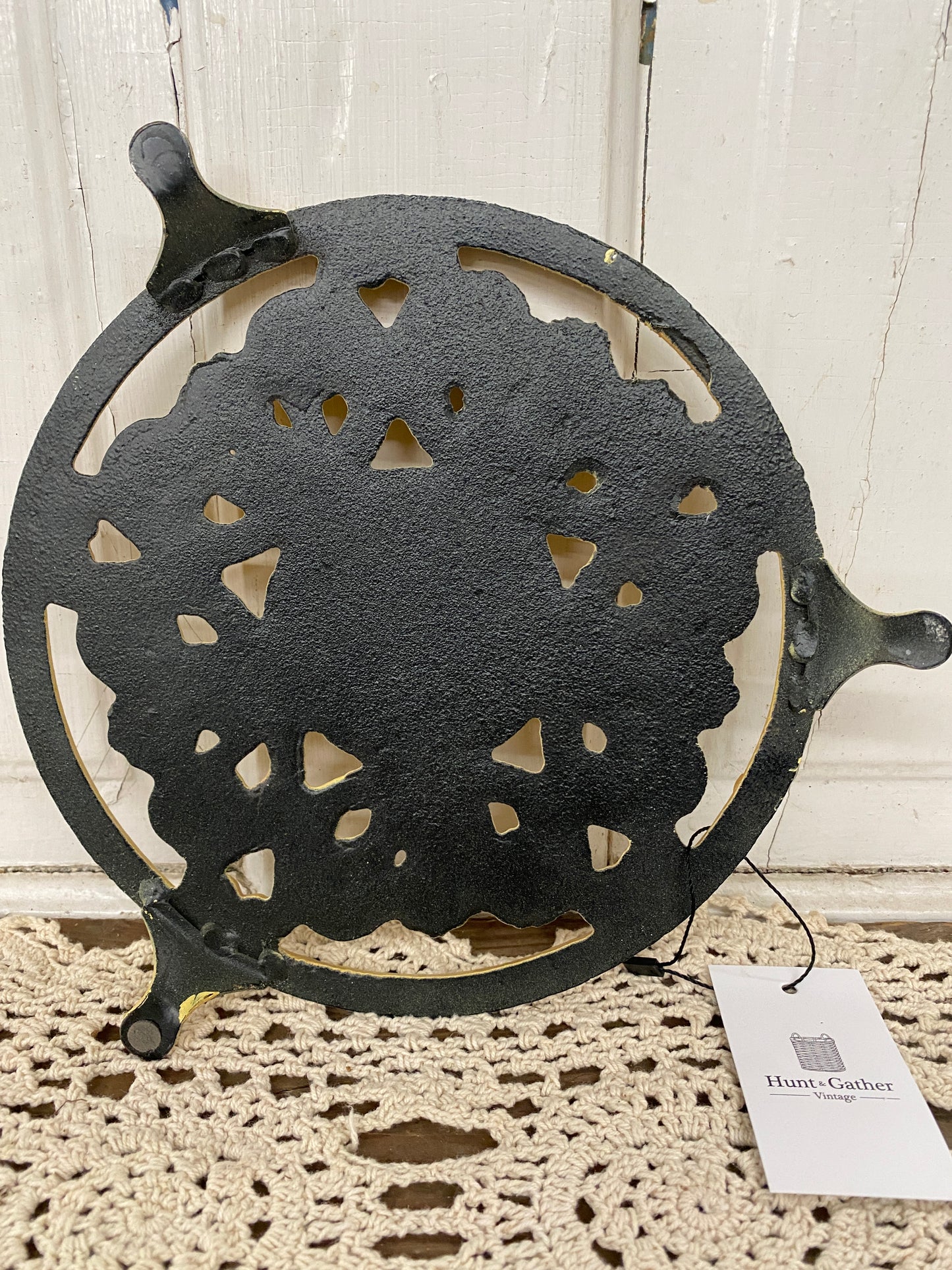 YELLOW IRON TRIVET