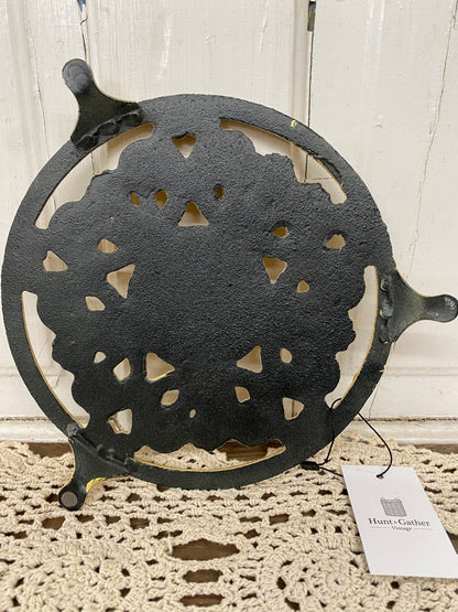 YELLOW IRON TRIVET