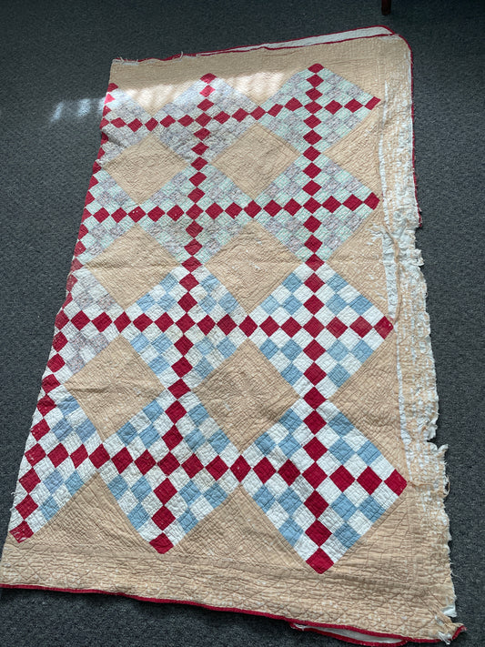 RED AND TAN CUTTER QUILT