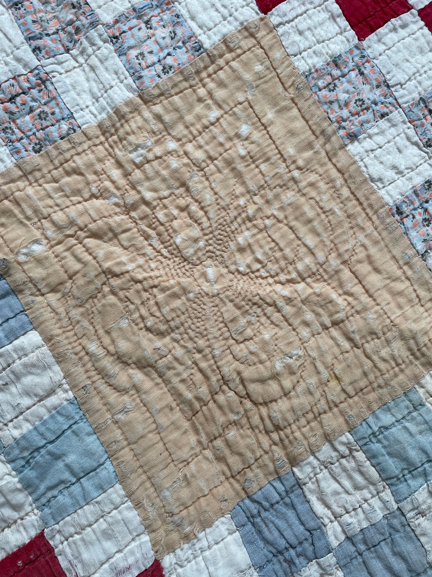 RED AND TAN CUTTER QUILT