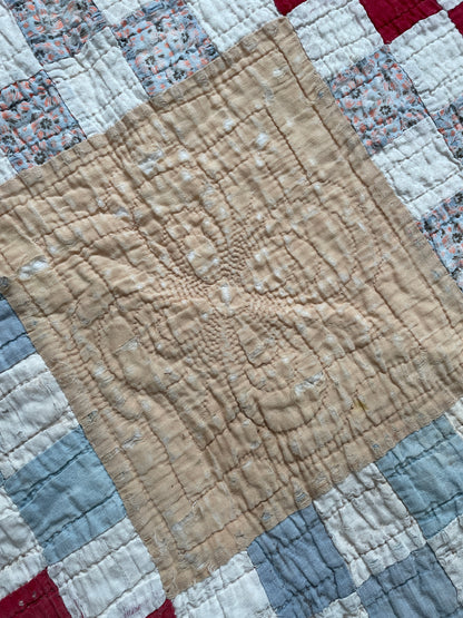 RED AND TAN CUTTER QUILT